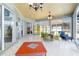 Spacious sunroom with abundant natural light, perfect for relaxation and entertaining at 1118 Deardon Dr, Venice, FL 34292