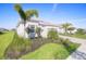 Charming single-Gathering home with manicured landscaping and a well-maintained lawn creating an inviting curb appeal at 15916 Sugar Hill Dr, Punta Gorda, FL 33982