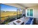 Screened lanai with outdoor seating, a fire pit, and a beautiful golf course view at 15916 Sugar Hill Dr, Punta Gorda, FL 33982