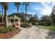 Tranquil gazebo and adjacent dog park area set amongst beautiful landscaping at 16734 Collingtree Xing, Lakewood Ranch, FL 34202