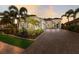 Inviting single-Gathering home with a paver driveway and tropical landscaping at 16734 Collingtree Xing, Lakewood Ranch, FL 34202