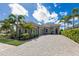 Inviting single-Gathering home with a paver driveway and well-maintained landscaping at 16734 Collingtree Xing, Lakewood Ranch, FL 34202