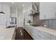 Modern kitchen featuring stainless steel appliances, sleek countertops, and stylish cabinetry at 16734 Collingtree Xing, Lakewood Ranch, FL 34202
