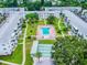 Community featuring inviting pool, shuffleboard courts, and meticulously kept lawns at 1815 Restful Dr # N-27, Bradenton, FL 34207