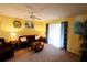 Inviting living room with comfortable sofa and chair plus stylish decor at 1815 Restful Dr # N-27, Bradenton, FL 34207