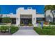 Charming entrance to 'The Clubhouse at Fairway Bay' with manicured landscaping and accessible entrance at 2020 Harbourside Dr # 454, Longboat Key, FL 34228