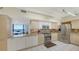 Gourmet kitchen with ocean view, stainless appliances, and lots of counter space at 2020 Harbourside Dr # 454, Longboat Key, FL 34228