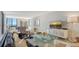 Bright living room with comfortable furniture and ocean views at 2020 Harbourside Dr # 454, Longboat Key, FL 34228