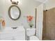 Clean bathroom features a tiled shower and a stylish vanity at 206 Elliot Ave # 137, Sarasota, FL 34232