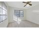 Bright bedroom with multiple windows and a ceiling fan at 206 Elliot Ave # 137, Sarasota, FL 34232