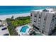 Condo poolside view of beach access and gorgeous green space at 2675 Gulf Of Mexico Dr # 403, Longboat Key, FL 34228