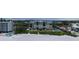 Aerial view of beachfront condo with beach access, pool, and well-maintained landscaping at 2675 Gulf Of Mexico Dr # 403, Longboat Key, FL 34228