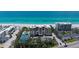 Coastal condos near beach with tennis court and pool, set against a stunning backdrop of turquoise water at 2675 Gulf Of Mexico Dr # 403, Longboat Key, FL 34228