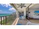 Enjoy ocean views from this condo's balcony, complete with seating and a ceiling fan at 2675 Gulf Of Mexico Dr # 403, Longboat Key, FL 34228