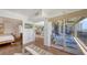 Living space showcasing sliding doors to balcony with wicker chairs and ocean view at 2675 Gulf Of Mexico Dr # 403, Longboat Key, FL 34228