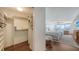 Well-organized walk-in closet with shelving and drawers, offering ample storage space at 2675 Gulf Of Mexico Dr # 403, Longboat Key, FL 34228
