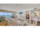 Spacious living area boasts beautiful ocean views, modern furniture, and an open, airy layout at 2675 Gulf Of Mexico Dr # 403, Longboat Key, FL 34228