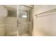 Close-up of a bathroom shower with glass door and towel bar at 2675 Gulf Of Mexico Dr # 403, Longboat Key, FL 34228