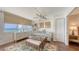 Bright sitting room featuring a daybed and large windows that offer ocean views and natural light at 2675 Gulf Of Mexico Dr # 403, Longboat Key, FL 34228