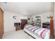 Bright bedroom with natural light, carpet floors, and ample shelving for storage and display at 270 E Langsner St, Englewood, FL 34223