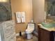 Bathroom features a unique glass sink and stone accents at 2816 N Lockwood Meadows Blvd, Sarasota, FL 34234