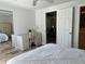 Bright bedroom boasts a woven desk, tile flooring, and ample natural light at 2816 N Lockwood Meadows Blvd, Sarasota, FL 34234