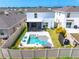 Beautiful backyard featuring a private pool, screened-in patio, and a well-maintained fenced yard for outdoor enjoyment at 3027 Great Abaco Way, Bradenton, FL 34208