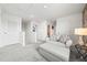 Upstairs bonus room with neutral colors and plenty of natural light, ideal for flexible living and leisure activities at 3027 Great Abaco Way, Bradenton, FL 34208
