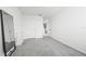 Neutral office space with carpet flooring, a full-length mirror, and two doors at 3027 Great Abaco Way, Bradenton, FL 34208
