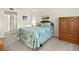 Bedroom boasting coastal-themed bedding and decor, offering a tranquil retreat at 305 30Th Ave W # A104, Bradenton, FL 34205