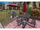 Community grilling area with barbecue and picnic table for outdoor enjoyment at 305 30Th Ave W # A104, Bradenton, FL 34205