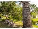 Tranquil scene of a park bench near a creek, offering a serene outdoor space at 305 30Th Ave W # A104, Bradenton, FL 34205