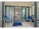 A cozy, tiled patio extends from the living space, offering serene views of the outdoors at 305 30Th Ave W # A104, Bradenton, FL 34205