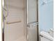 Tiled shower features safety bar and glass enclosure at 305 30Th Ave W # A104, Bradenton, FL 34205