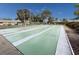 Outdoor shuffleboard courts offer a recreational space for friendly competition and community engagement at 305 30Th Ave W # A104, Bradenton, FL 34205