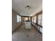 A partially renovated laundry room with exposed framing and abundant natural light at 305 59Th St, Holmes Beach, FL 34217
