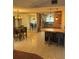 Open floor plan featuring kitchen with breakfast bar and a dining room set at 3052 51St St, Sarasota, FL 34234