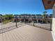Community view from a wooden balcony at 3333 Ramblewood Pl, Sarasota, FL 34237