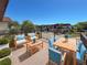 Outdoor deck space with comfortable seating and dining, perfect for enjoying the view at 3333 Ramblewood Pl, Sarasota, FL 34237