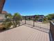 Spacious outdoor deck with metal railings and space for entertaining at 3333 Ramblewood Pl, Sarasota, FL 34237