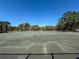 Community tennis courts on a bright day at 3333 Ramblewood Pl, Sarasota, FL 34237