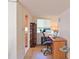 Cozy office space with wood floors, desk, and natural lighting at 3802 Gulf Of Mexico Dr # A103, Longboat Key, FL 34228