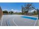 Community basketball court featuring two hoops and a blue and gray sports surface at 415 63Rd St, Holmes Beach, FL 34217