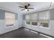 A bright and airy sun room with lots of natural light and ceramic tile floors at 415 63Rd St, Holmes Beach, FL 34217