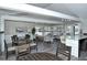Comfortable common area with seating, tables, and natural light, perfect for socializing at 4375 Trails Dr # 17-1, Sarasota, FL 34232