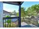 Inviting deck surrounded by lush greenery, offering a tranquil outdoor living space at 4375 Trails Dr # 17-1, Sarasota, FL 34232