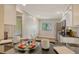 Bright kitchen featuring a window view, stainless steel appliances, and sleek black countertops at 4375 Trails Dr # 17-1, Sarasota, FL 34232