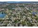 A captivating aerial view showcases the home's prime location within a community near several bodies of water at 4619 20Th W Ave, Bradenton, FL 34209