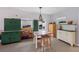 A large bonus room with tile floors, unique furnishings, and ample storage cabinets at 4619 20Th W Ave, Bradenton, FL 34209