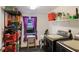 Efficient laundry room with black appliances and ample storage space at 4619 20Th W Ave, Bradenton, FL 34209